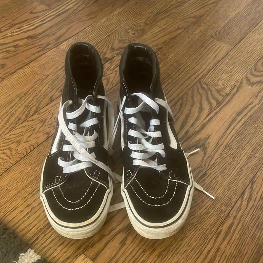 Unisex black and white high top vans